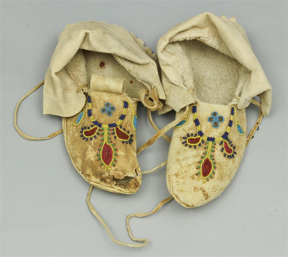 Appraisal: NATIVE AMERICAN BEADED HIDE MOCCASINS Plains Ponca Pawnee circa soft