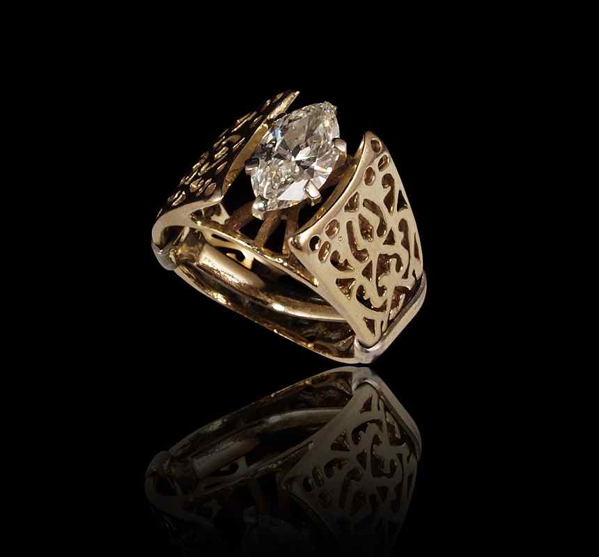 Appraisal: CT MARQUISE DIAMOND SOLITAIRE RING K yellow gold filigree ring