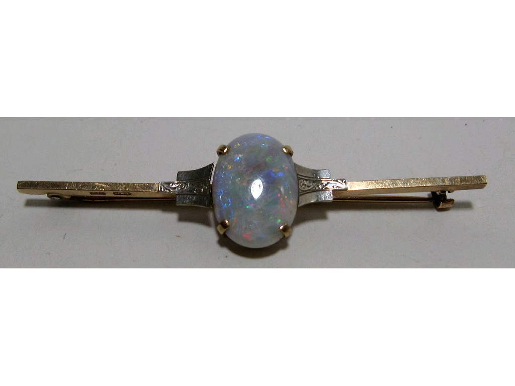 Appraisal: Nineteen twenties 's ct bi colour gold opal set bar