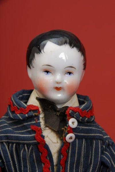 Appraisal: All Original China Boy France ca china shoulder head boy