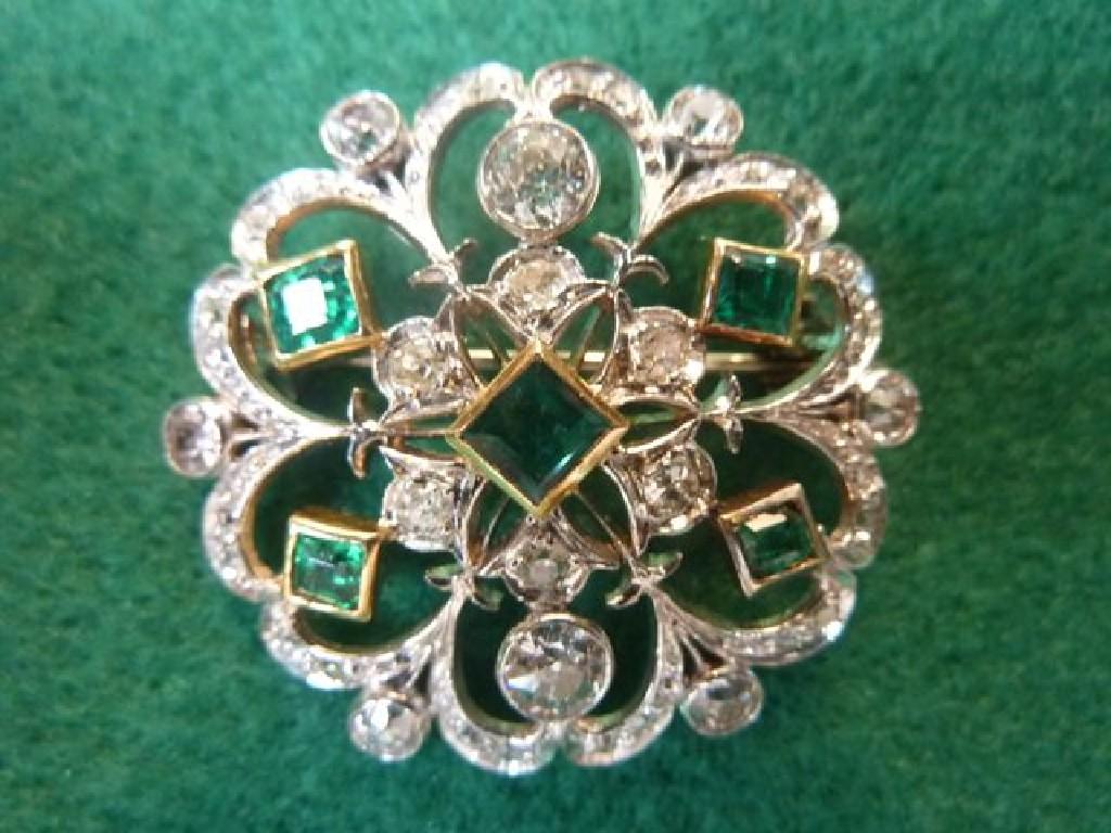 Appraisal: An enamel and diamond set brooch of open work cluster