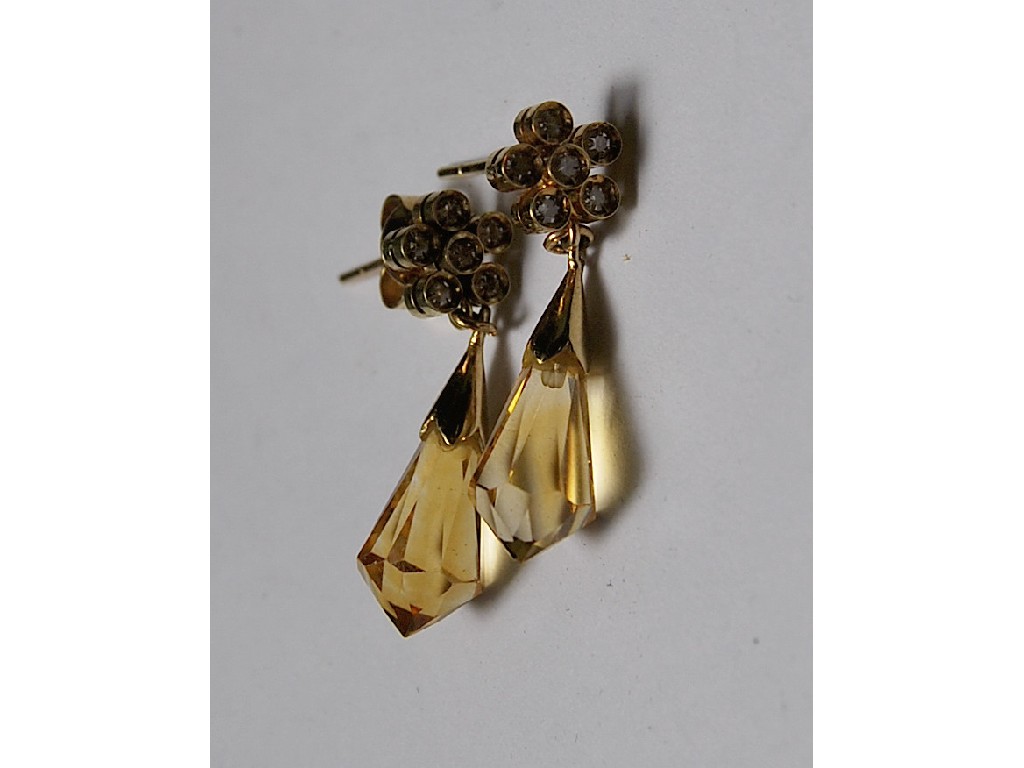 Appraisal: A pair of K gold stud earrings set with diamond