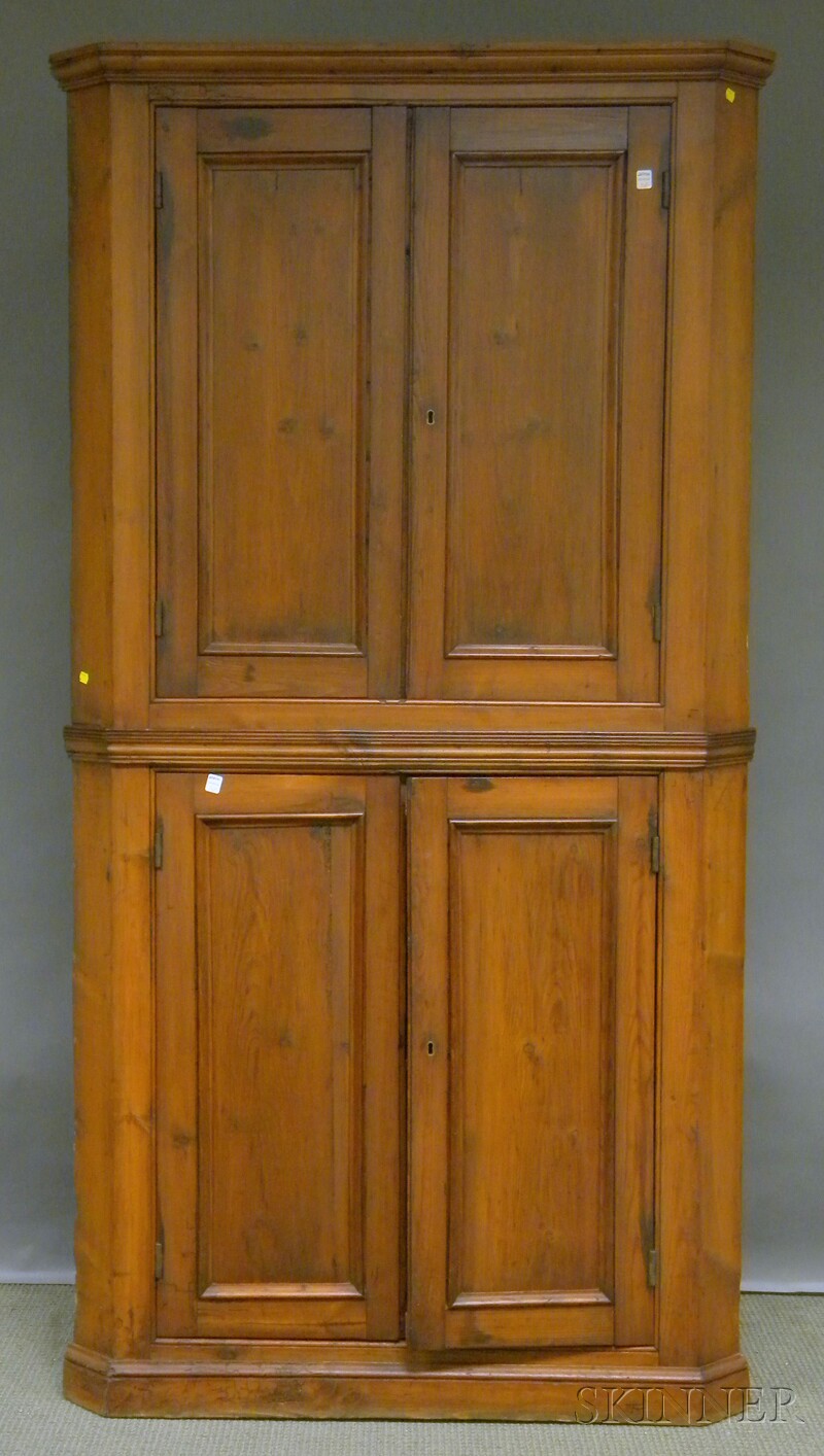 Appraisal: Country Pine Paneled Four-door Corner Cupboard in two parts approx