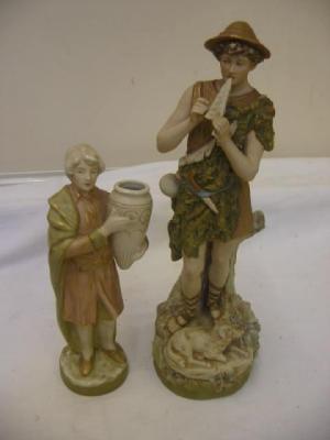 Appraisal: A ROYAL DUX PORCELAIN FIGURE modelled as a shepherd playing