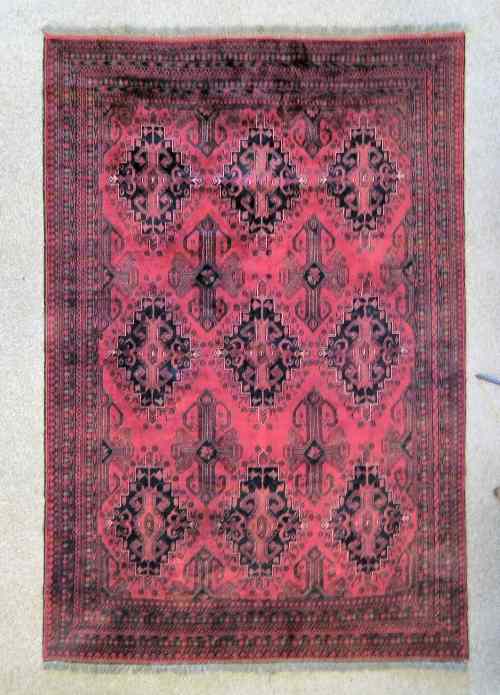 Appraisal: A th Century carpet of ''Beluch'' design woven in muted