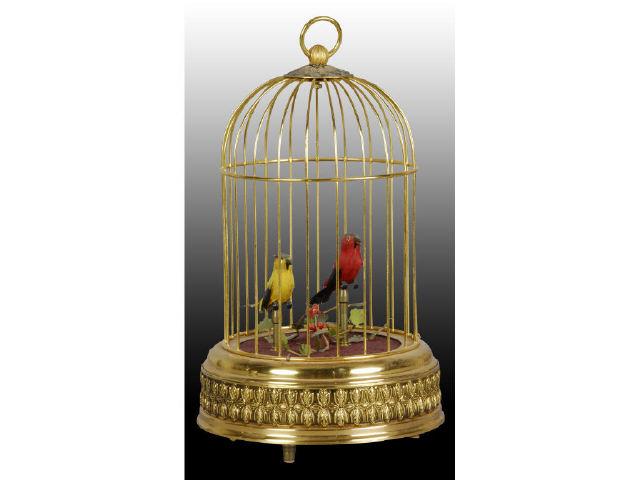 Appraisal: West Germany Mechanical Bird Cage Music Box Description Both birds