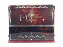 Appraisal: A fine silver and tortoiseshell stationery box the sloping front