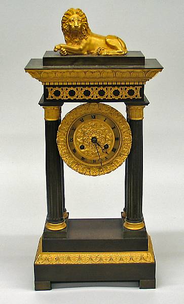 Appraisal: A Charles X patinated and gilt bronze portico mantel clock