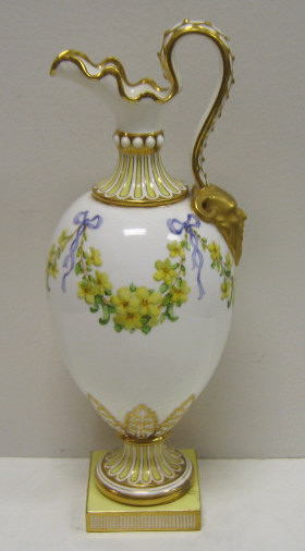 Appraisal: MINTON PORCELAIN EWER Decorated with yellow flowers and blue bow