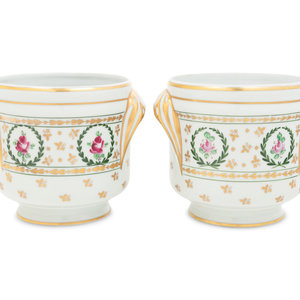 Appraisal: A Pair of Limoges Porcelain Cache Pots Imported by Ebeling