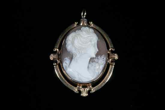 Appraisal: YELLOW GOLD FRAMED OVAL CARVED SHELL CAMEO PIN PENDANT early