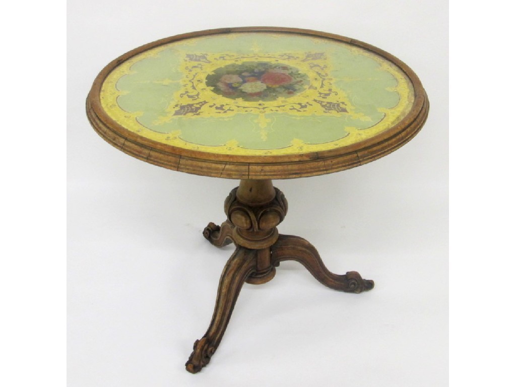 Appraisal: A Victorian walnut circular window table the top decorated with