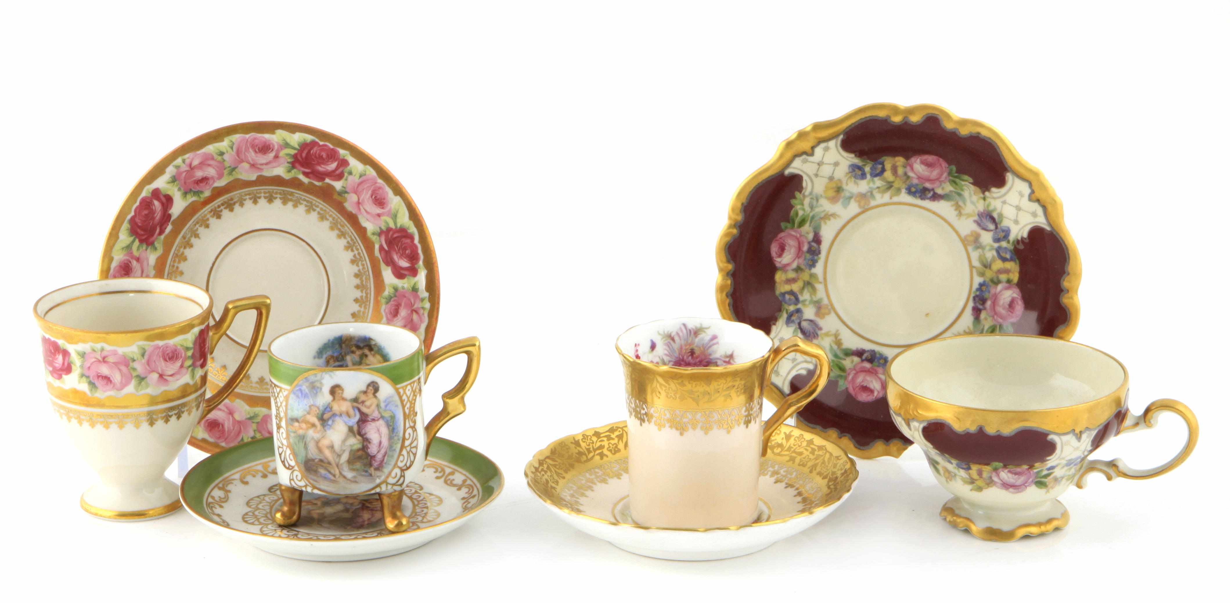 Appraisal: An assembled group of fourteen Continental porcelain demitasse cups and