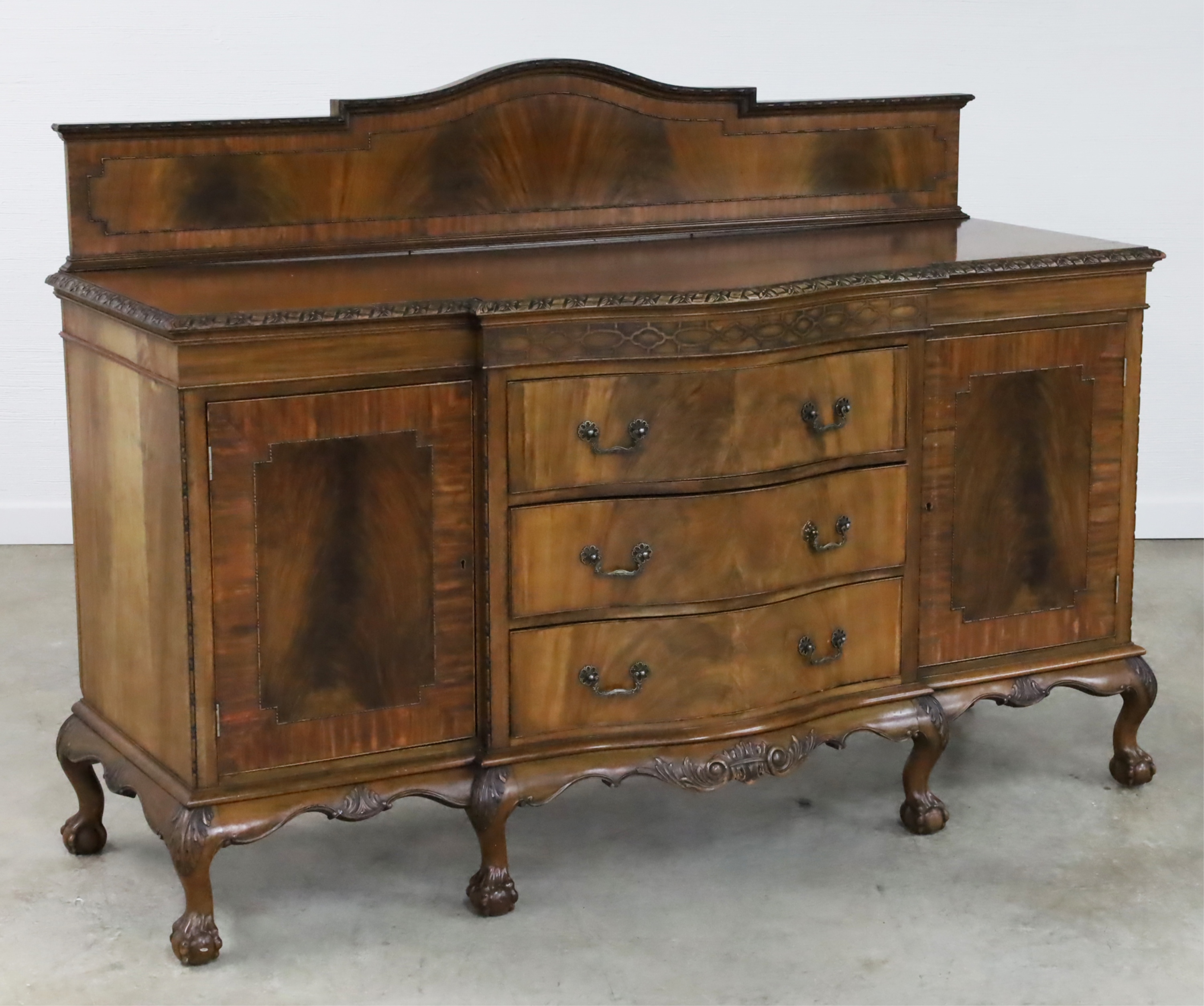 Appraisal: ENGLISH CHIPPENDALE STYLE SIDEBOARD English Chippendale style crotch mahogany front