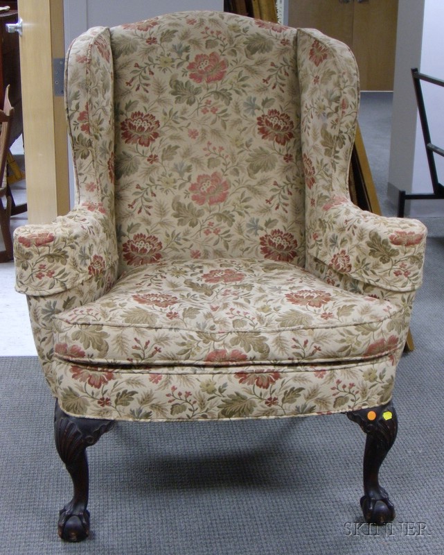 Appraisal: Chippendale-style Upholstered Carved Mahogany Wing Chair