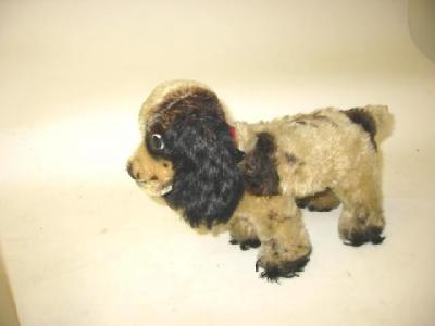 Appraisal: A Steiff standing dog Cockie covered in cream and brown