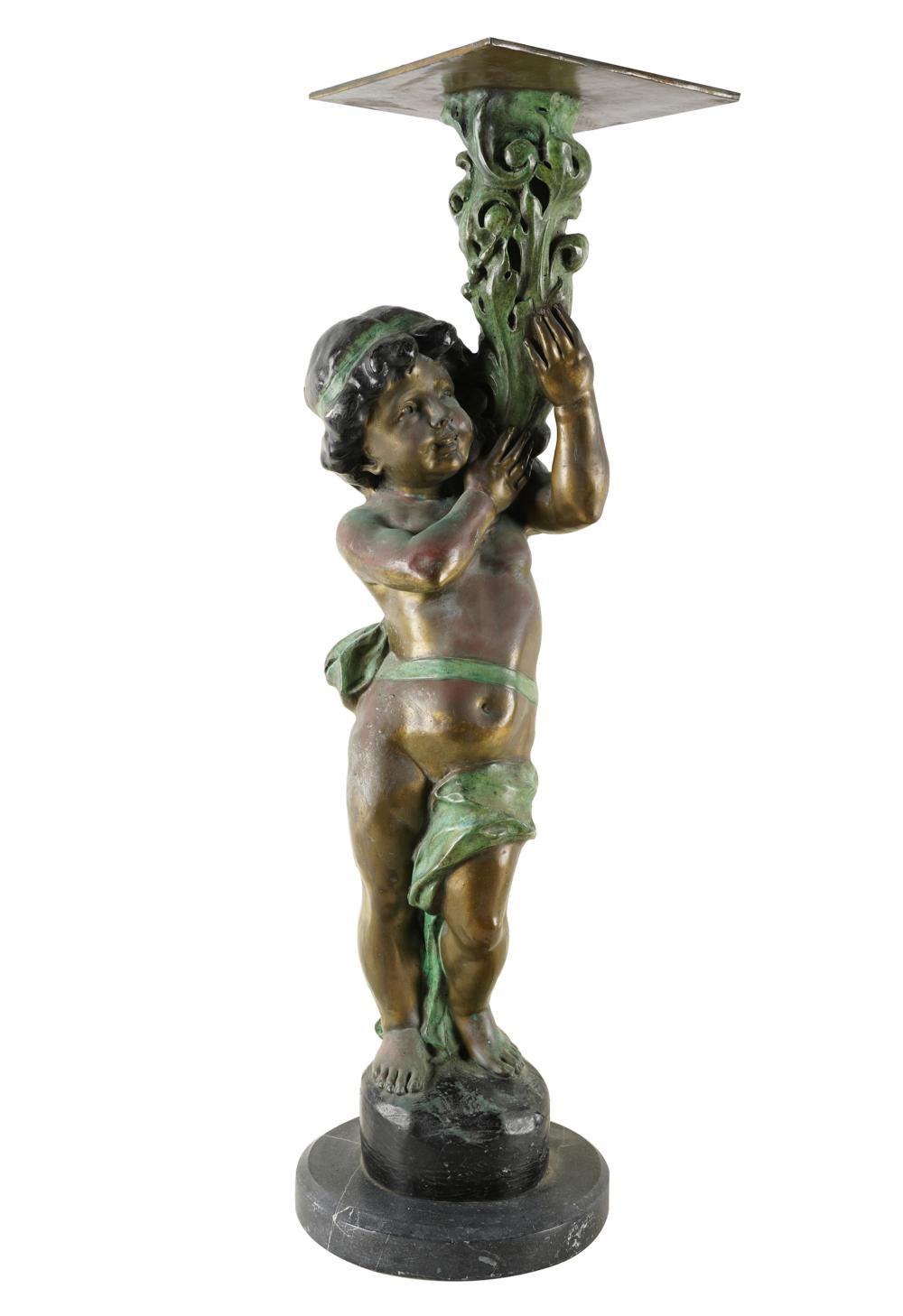 Appraisal: PATINATED METAL FIGURE OF A CHERUBsigned Houdon to base set