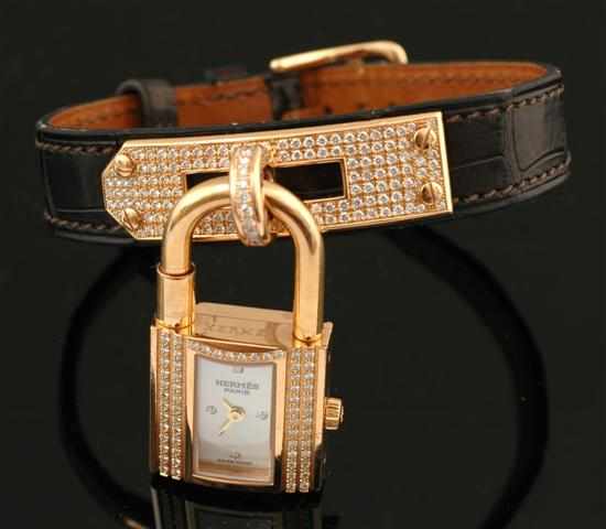 Appraisal: A Ladies Kelly diamond wristwatch by Hermes Quartz movement rectangular