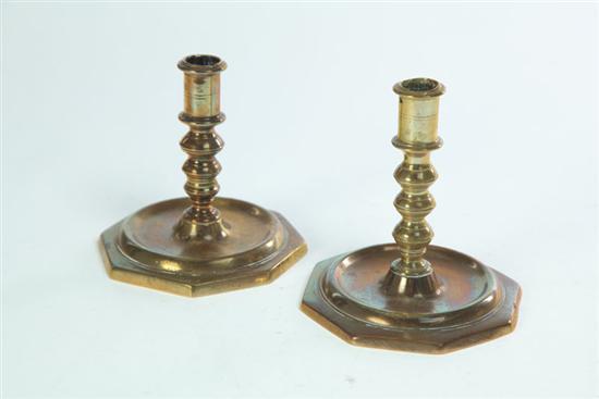 Appraisal: TWO BRASS CANDLESTICKS Probably Spain late th-early th century Similar