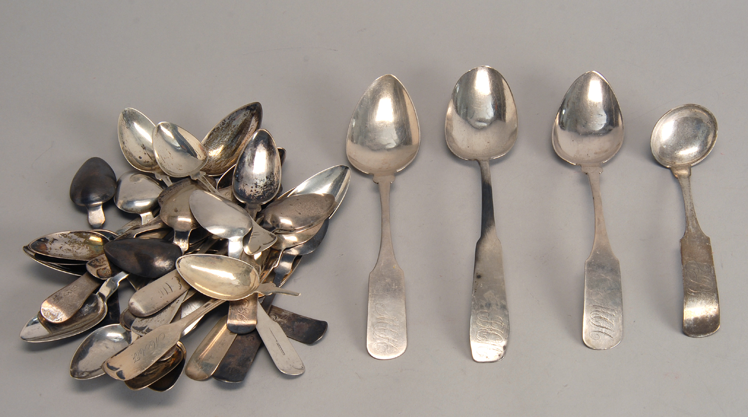 Appraisal: THIRTY-TWO AMERICAN SILVER SPOONS by various makers Includes three serving