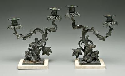 Appraisal: Pair bronze candelabra with dogs each with two arms bases