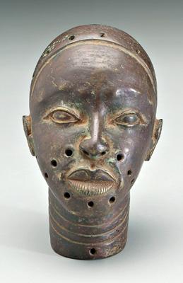 Appraisal: Cast bronze African head attached tag attributes to Nigeria Benin