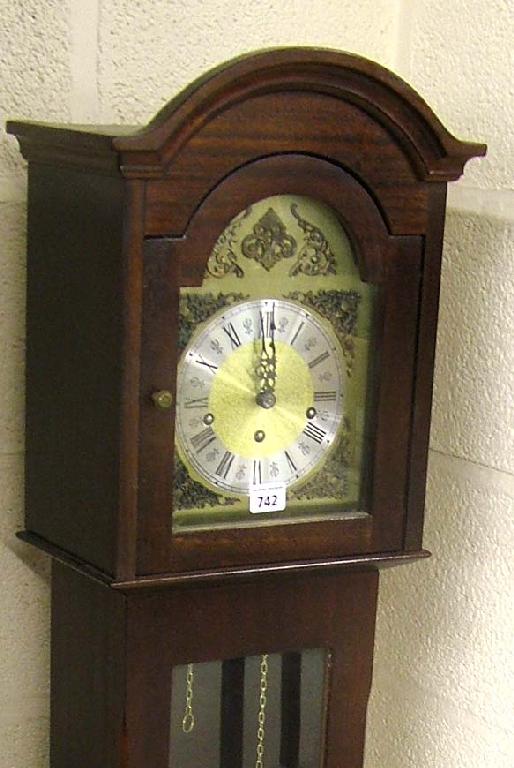 Appraisal: Contemporary three train grandmother clock the arched brass dial within