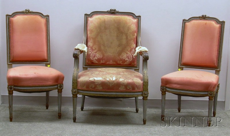 Appraisal: Three Louis XVI Style Upholstered Parcel-gilt and Painted Carved Wood