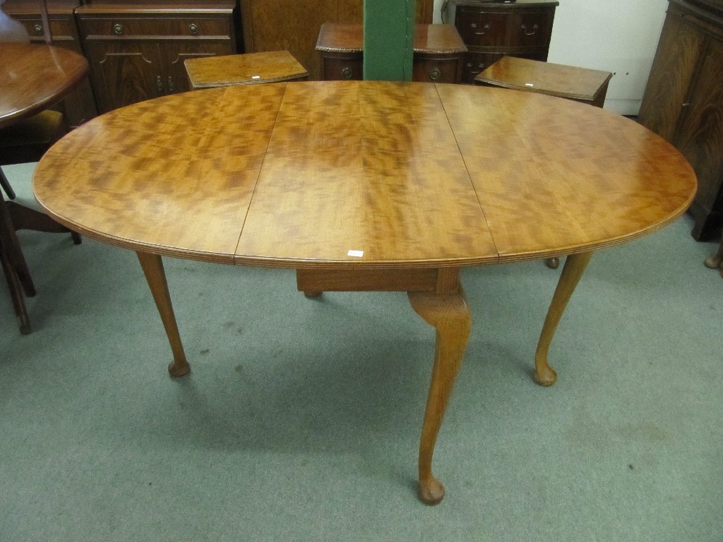 Appraisal: Walnut chest of drawers and a drop leaf dining table