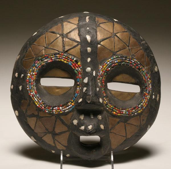 Appraisal: African Luba carved wooden mask inlaid with various elements including