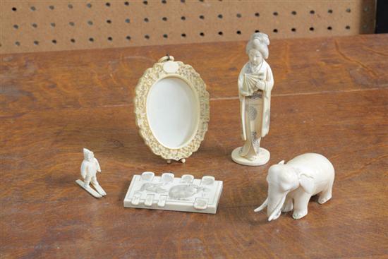 Appraisal: FIVE PIECES OF IVORY An Oriental woman with fan ''