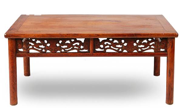 Appraisal: A Chinese low table with circular legs and pierce craved