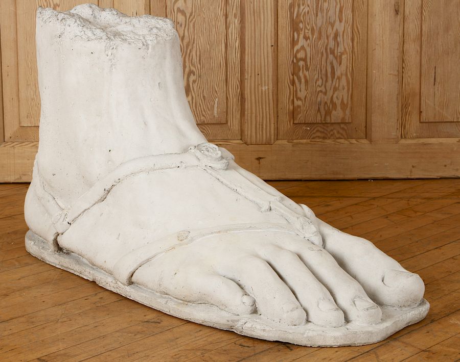 Appraisal: MONUMENTAL NEOCLASSICAL STYLE CAST STONE FOOT A monumental Neoclassical style