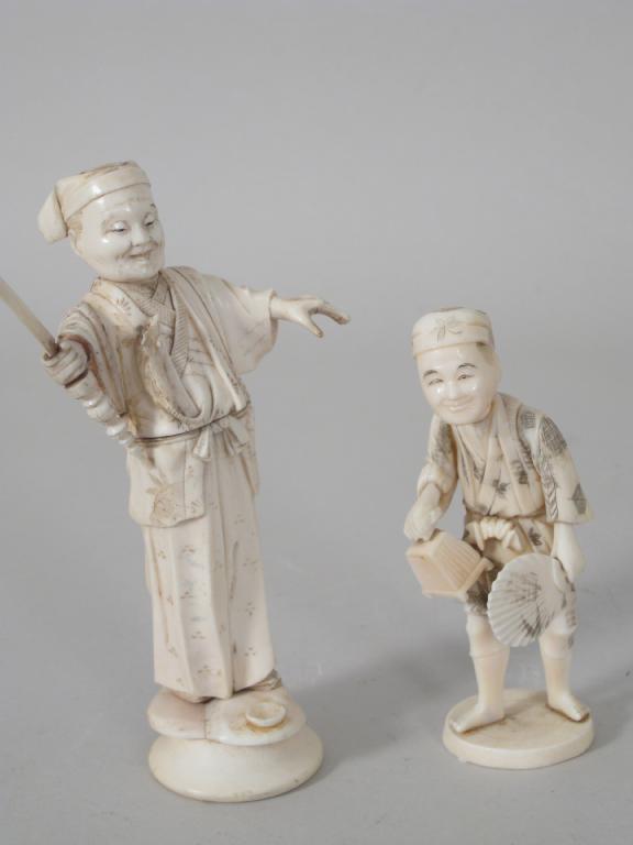 Appraisal: Two Japanese ivory Figures Boy with fan and cricket cage