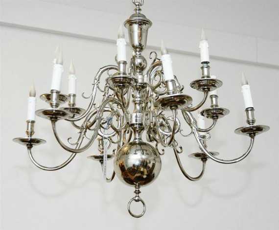 Appraisal: PAIR OF CHANDELIERS Baroque style German Silver-plated bronze Fitted for