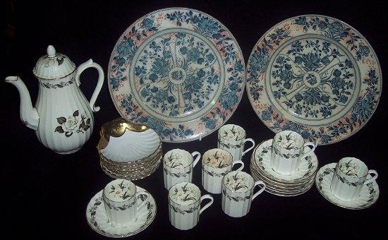 Appraisal: A Royal Worcester 'Engadine' pattern coffee service comprising eight cans