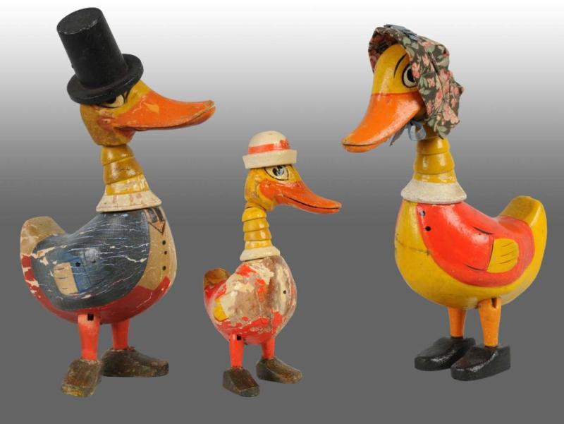 Appraisal: Lot of Early Schoenhut Quaky Doodle Duck Toys Description American