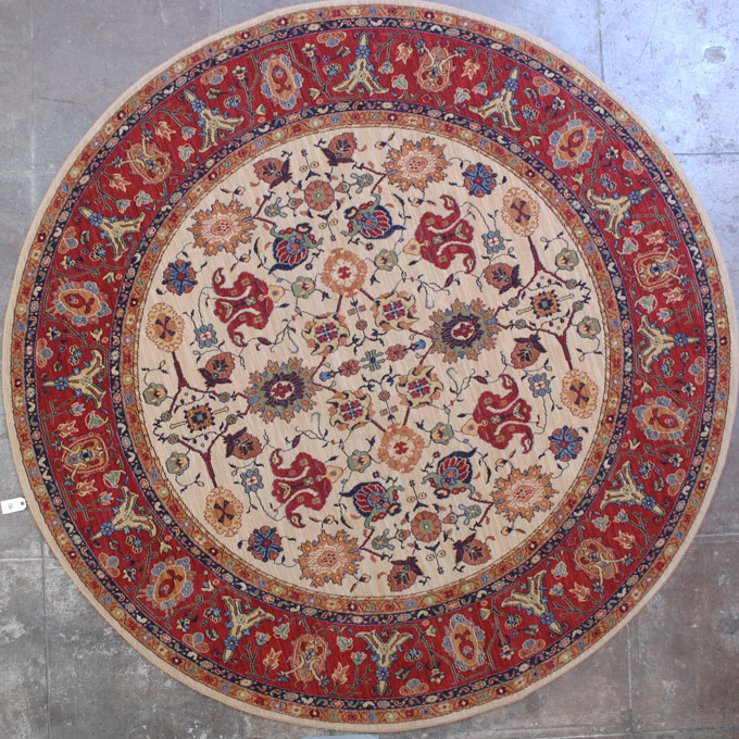 Appraisal: A ROUND KARASTAN CARPET English Manor Collection Stratford pattern machine