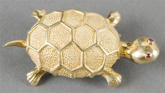 Appraisal: KT yellow gold turtle pin with ruby eyes Turtle is