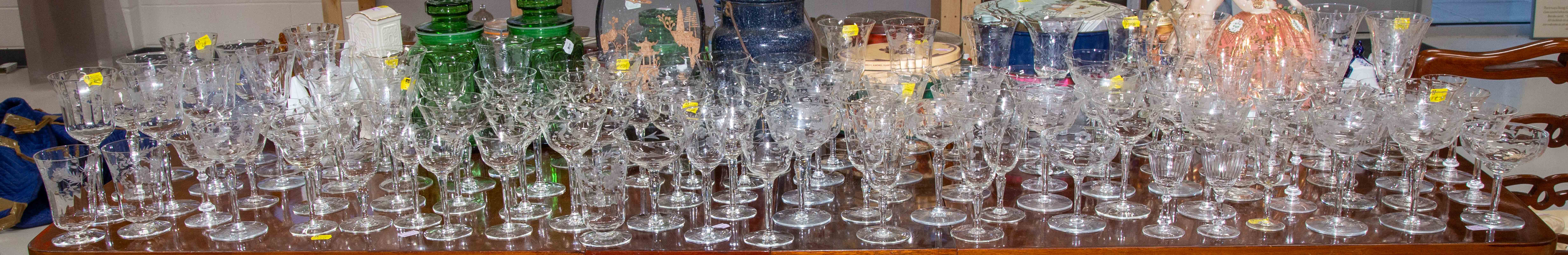 Appraisal: LARGE ASSORTMENT OF ETCHED GLASS STEMWARE In several different patterns