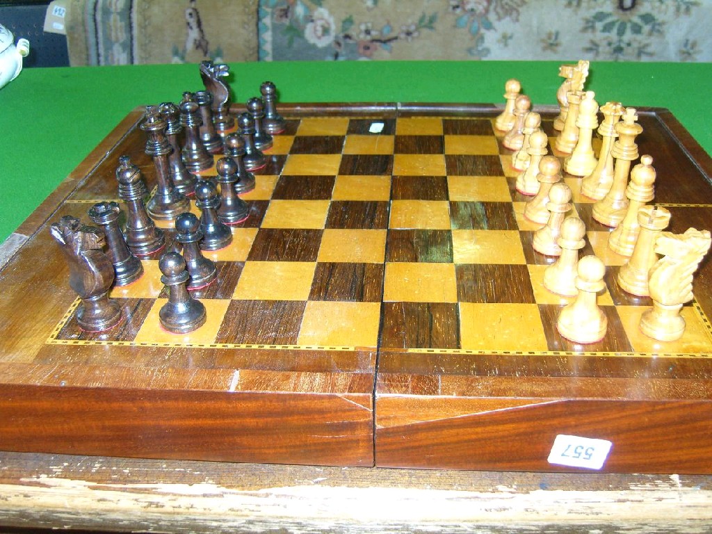 Appraisal: A mahogany games box with inlaid chessboard detail to the