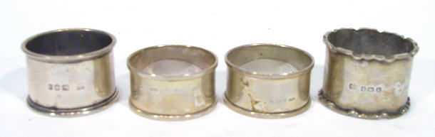 Appraisal: Pair of silver napkin rings and two others