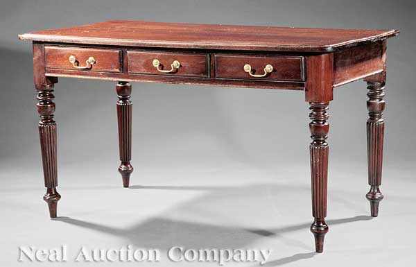 Appraisal: A Regency-Style Carved Mahogany Writing Table th c probably Anglo-Colonial