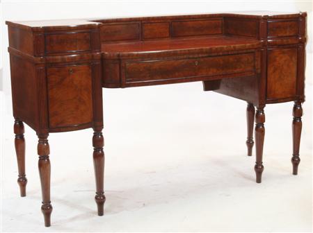 Appraisal: A th century mahogany breakfront sideboard the three quarter gallery