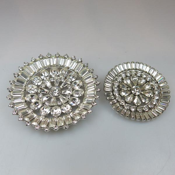 Appraisal: Two Jayflex Sterling Silver Circular Brooches set with various clear