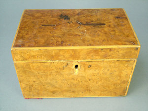 Appraisal: A George III burr wood tea caddy the interior with