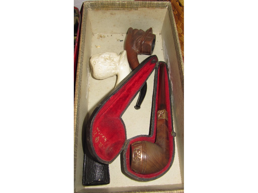 Appraisal: Lot comprising three pipes and a cigar holder