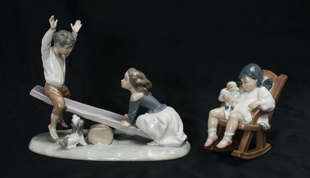 Appraisal: LLADRO PORCELAIN FIGURINES SEE-SAW Fulgencio Garcia sculptor issued retired ''