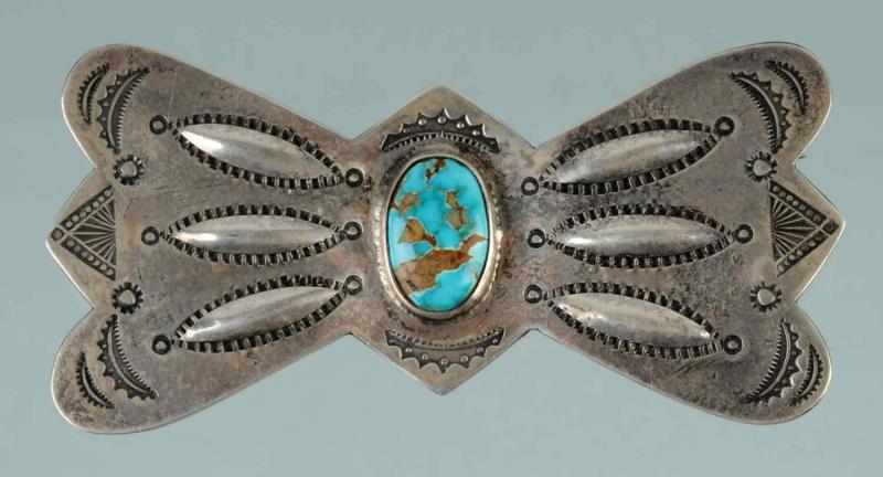 Appraisal: Native American Indian Silver Bow-Shaped Pin Description With turquoise stone