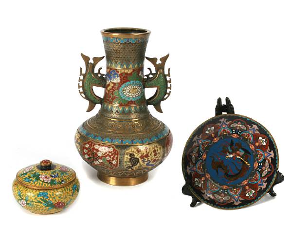 Appraisal: A group of Asian cloisonne enameled metal containers and enamled